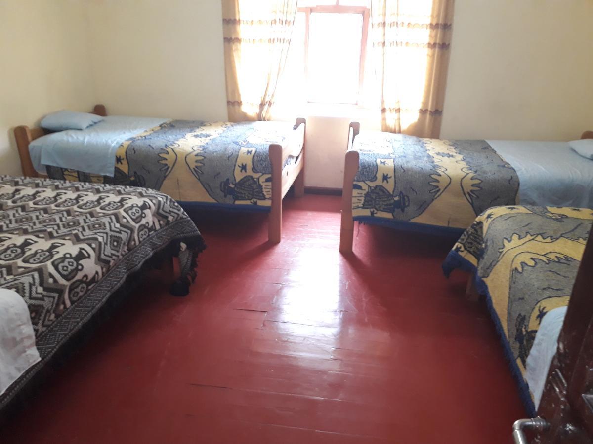 Auquis Ccapac Guest House Cuzco Buitenkant foto