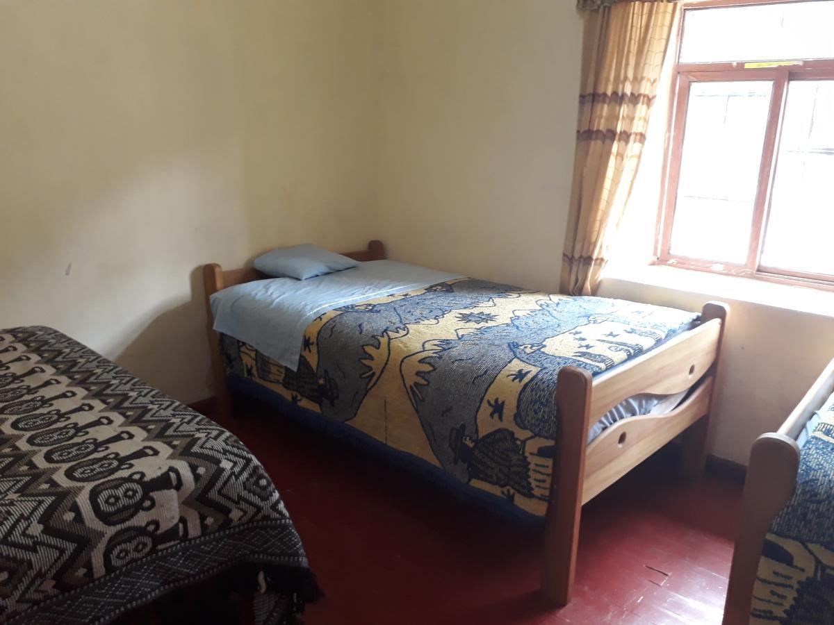 Auquis Ccapac Guest House Cuzco Buitenkant foto