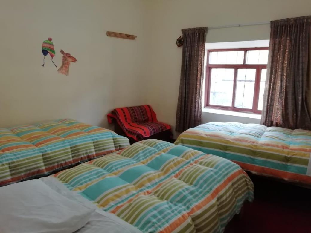 Auquis Ccapac Guest House Cuzco Buitenkant foto