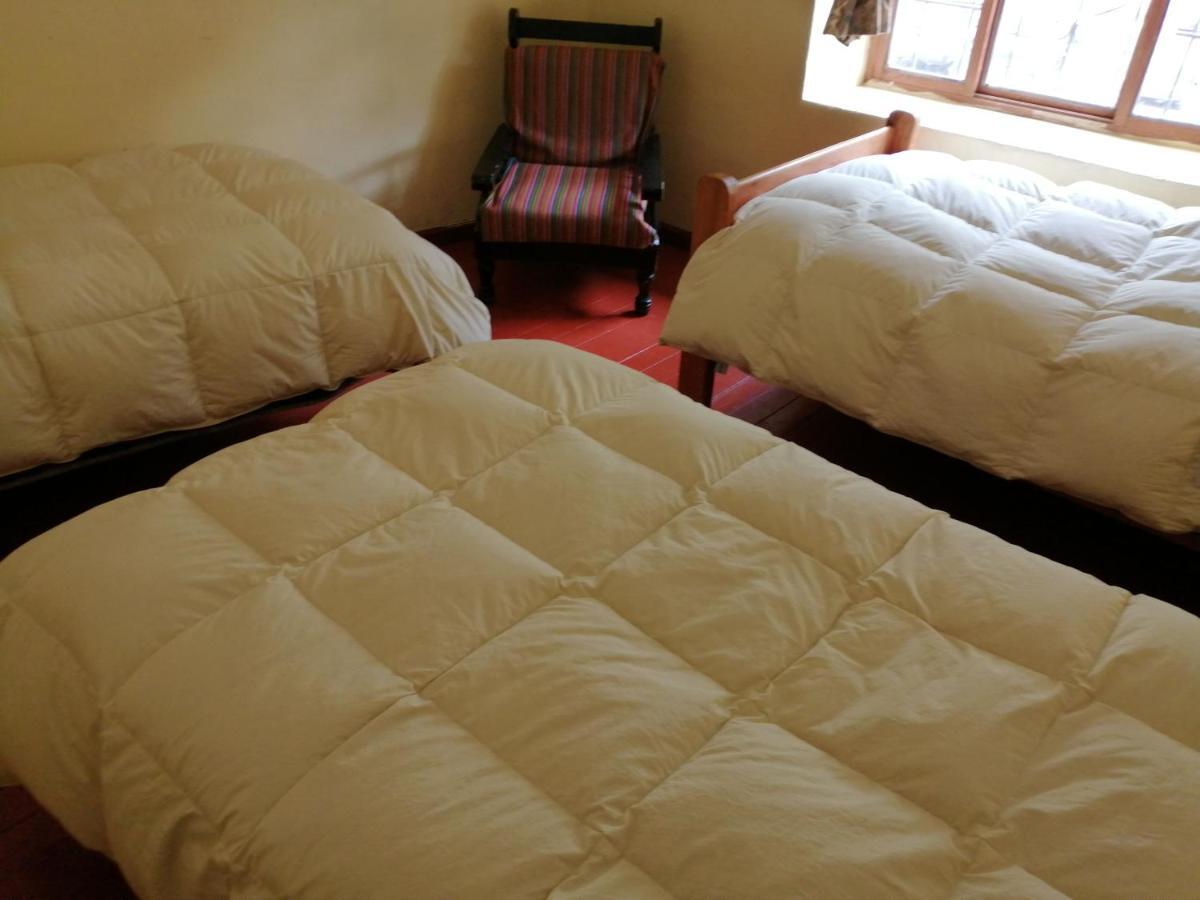 Auquis Ccapac Guest House Cuzco Buitenkant foto